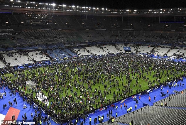 The Stade de France was attacked by suicide bombers supporting ISIS in 2015. In the photo, spectators jump onto the pitch.