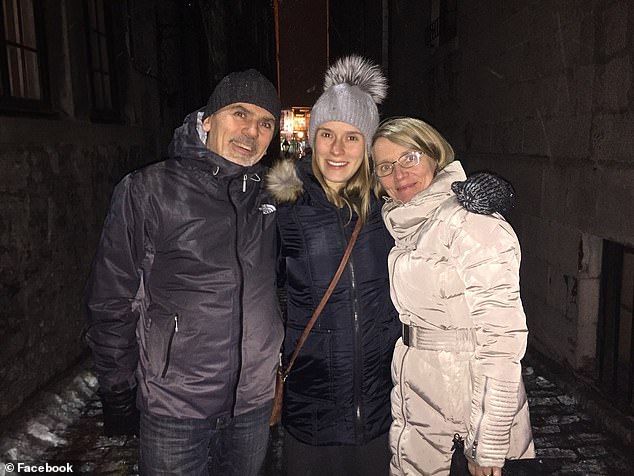 Her husband Robert, 59 (left), was driving the van pulling the caravan in which Woroniecka (right) was traveling. They are photographed with one of her daughters who may have been with them on the trip.