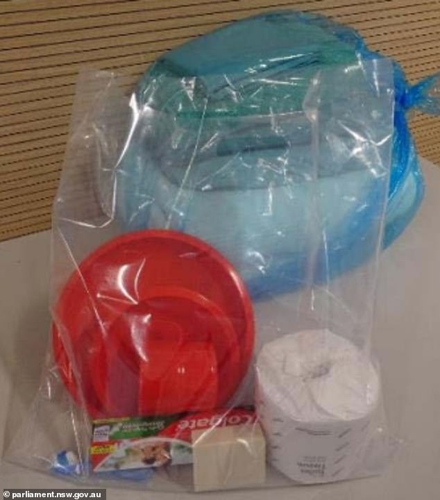 Del Busso's possessions inside the jail consist of his receiving package which includes a toothbrush and toothpaste, soap, a plate, bowl and cup, and a roll of toilet paper.