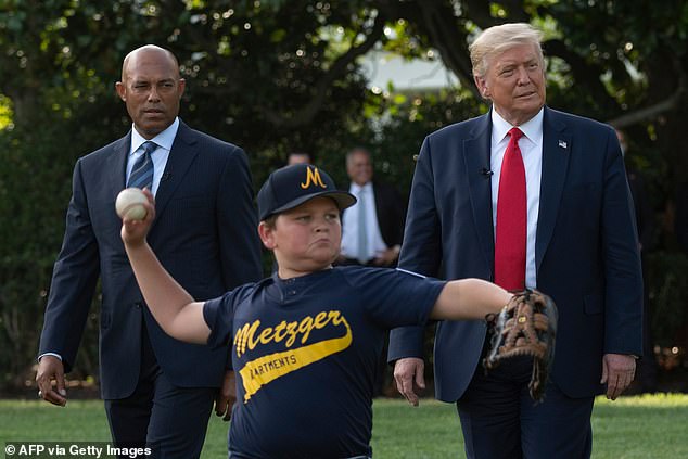 Trump (right) and Rivera (left) watch young baseball players at the White House in 2020
