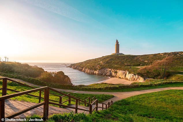 Pictured is the Hercules Tower, a landmark at the entrance to the port of La Coruña.