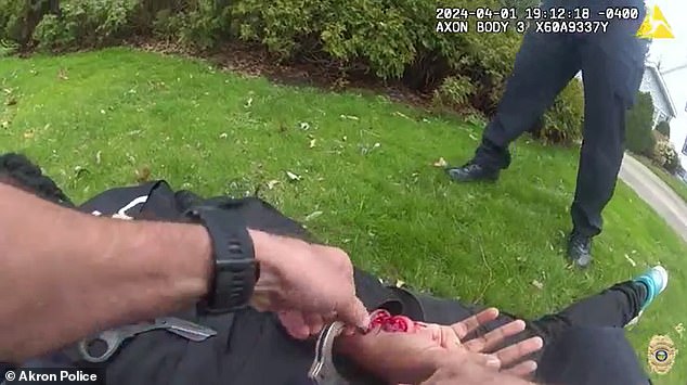 Koonce-Williams dropped the toy and fell to the ground, tearfully telling the officers: 