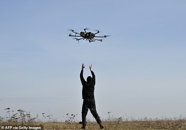 A pilot practices with a drone at a training ground in the kyiv region on February 29, 2024, amid the Russian invasion of Ukraine.
