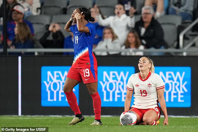 Crystal Dunn was in disbelief that she was called for a foul, giving Canada a late penalty kick.