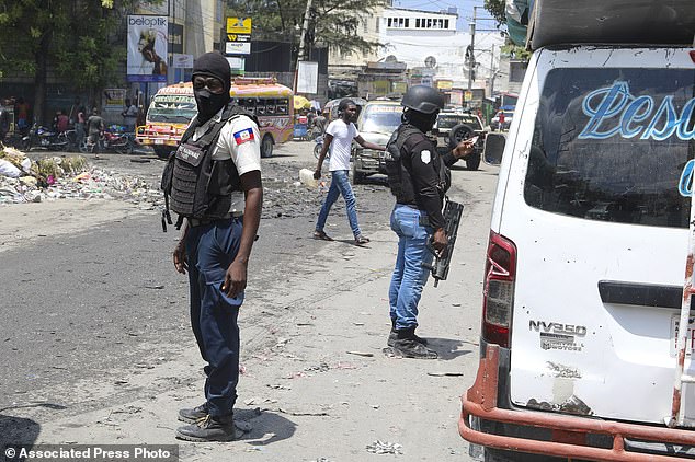 National Police patrol an intersection amid gang violence in Port-au-Prince, Haiti, Monday, April 8, 2024.