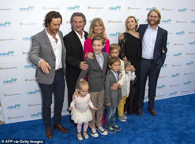Oliver and Bartlett got engaged in 2004. After saying 'I do', the couple welcomed three children together: Wilder, 16, Bodhi, 13, and Rio, 10; (LR) Oliver, Kurt Russell, Goldie, Wyatt Russell and Kate, with their children Ryder Robinson, Wilder, Bodhi, Rio and Bingham Bellamy in 2016