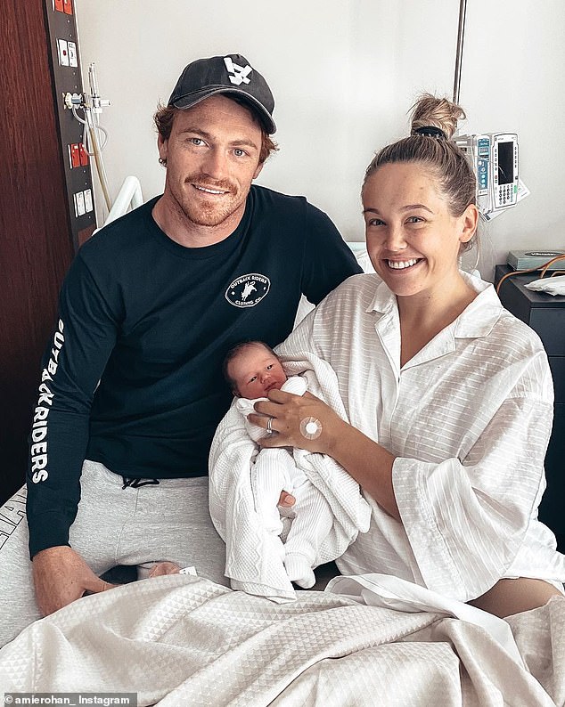 Amie was married to Geelong Cats forward Gary Rohan (left) for four years. The childhood sweethearts suffered a heartbreaking breakup after the death of her first daughter just five hours after her birth. In the photo: the couple with their daughter Sadie.