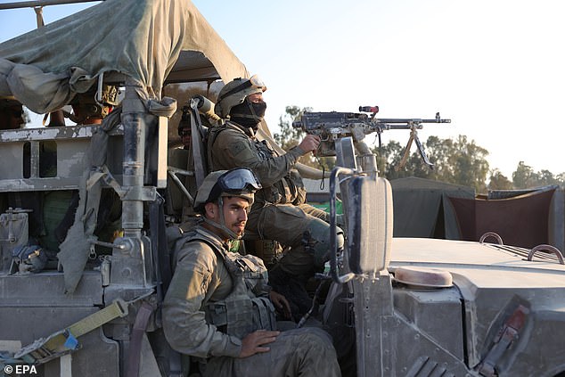 Israeli soldiers at a checkpoint along the Gaza border in southern Israel.