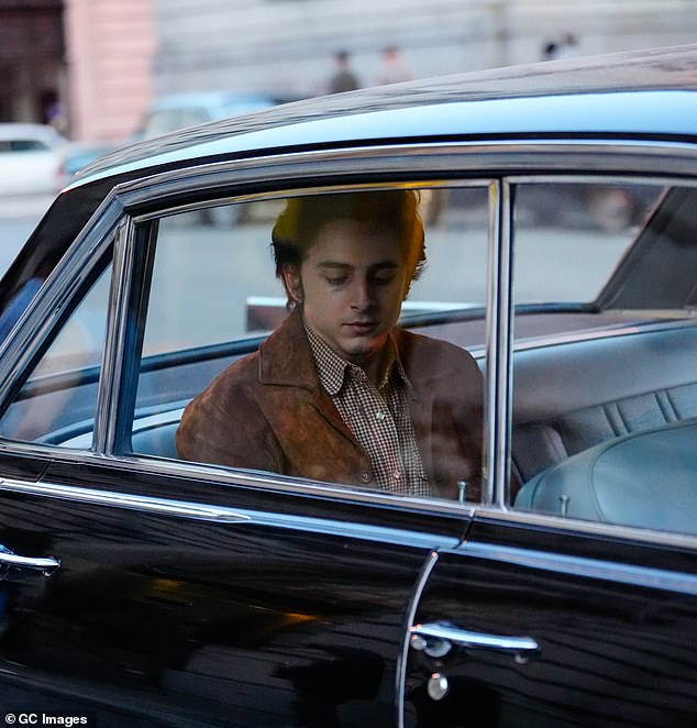 Other snapshots from the filming showed Timothée [as Bob] looking helpless once inside the car