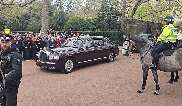 The monarch was pictured greeting supporters outside the royal residence as he was driven around in his state-run Bentley limousine.