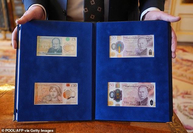 The other side of the £5 and £10 notes can be seen on the left, while the £20 and £50 notes with the King's face can be seen on the right.