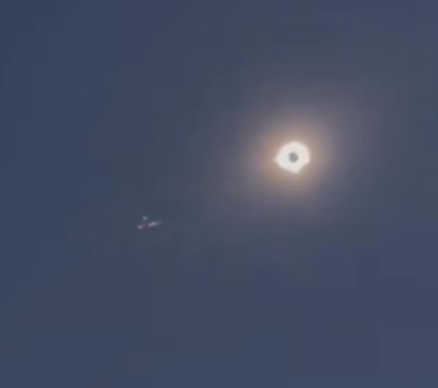 But solar eclipse viewers saw another plane flying over the event in McKinney, which is about 50 miles from Arlington.