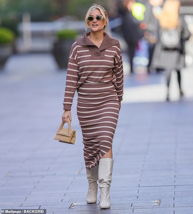Ashley Roberts, the showbiz reporter for Amanda's show, stunned in a long brown and cream horizontal striped dress with a large collar.