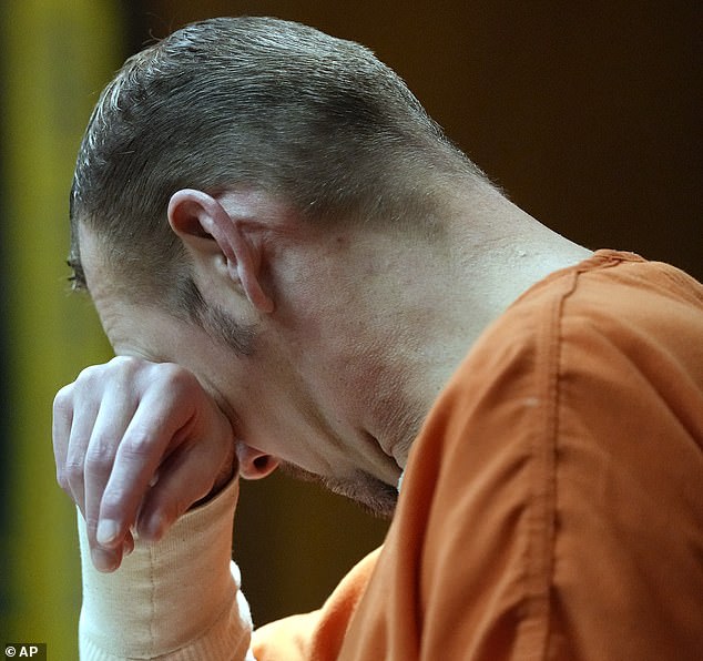 James Crumbley is seen crying in court on Monday as he and his wife Jennifer received a historic sentence of 10 to 15 years for the 2021 school massacre of their son Ethan.