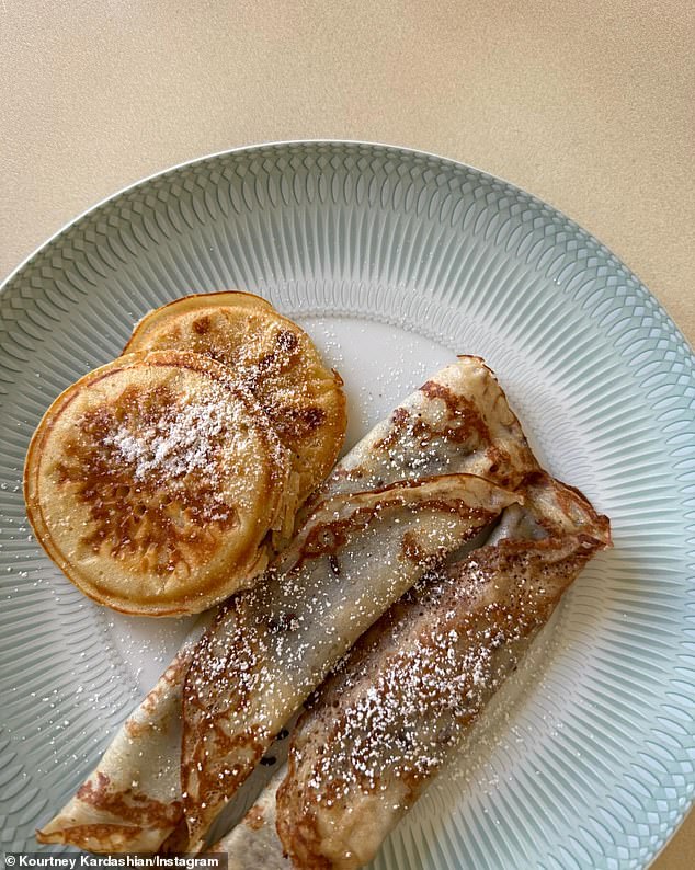 Kardashian also uploaded images of her breakfast, which consisted of two golden pancakes and crepes sprinkled with powdered sugar, and a photo of herself at sunset.