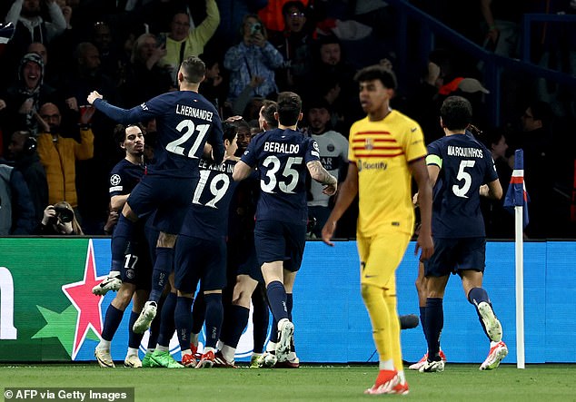 PSG players celebrate with the winger, who scored a rare goal in the colors of his club
