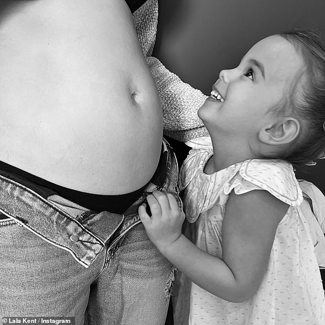 She announced her latest pregnancy last month, posting a touching snap of her three-year-old daughter Ocean smiling at her growing belly.