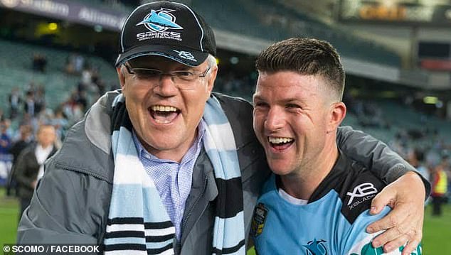 Morrison has been a regular face at Sharks games, pictured with former premiership-winning midfielder Chad Townsend.
