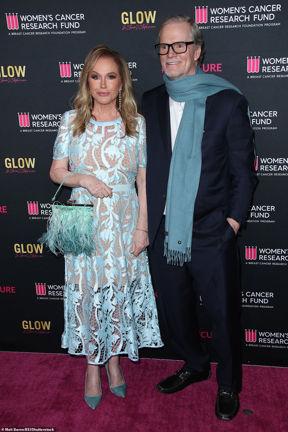 The mother of Paris and Nicky Hilton was accompanied at the gala by her husband Rick Hilton.  She looked elegant in a black suit and a blue-gray scarf that complemented his wife's outfit.