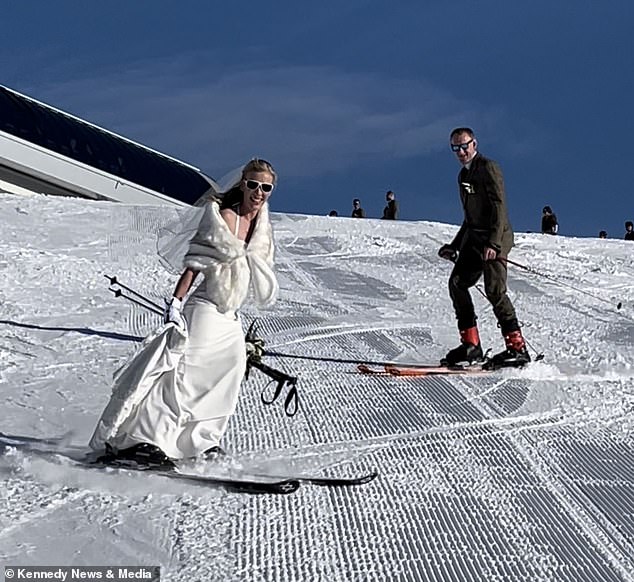Laura said her dress had a long train but luckily she was able to make it to the end of the slope without breaking it.