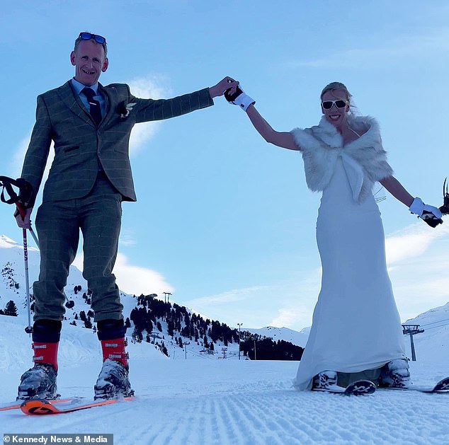 The equine physical therapist then skied down the 2.5-mile red and blue slope in her wedding dress with Robert while wearing her veil and holding her bouquet.