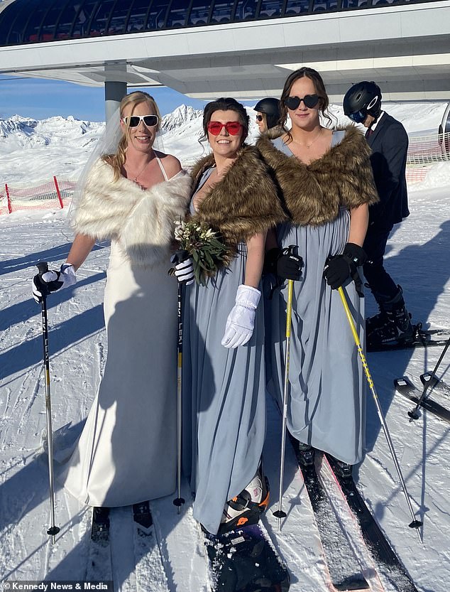 Laura posed for a photo with her two bridesmaids, Megan and Sarah, on top of the snowy mountain.