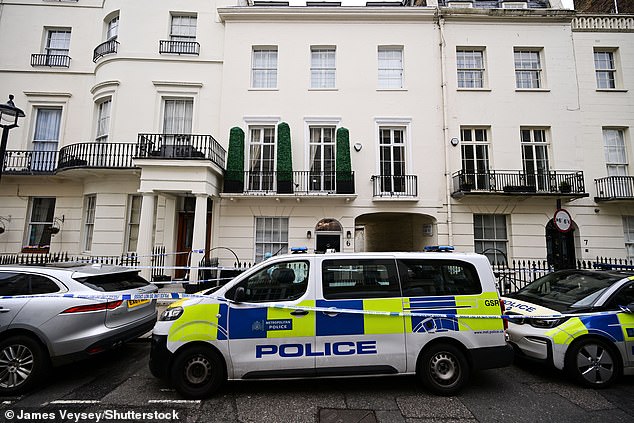 Police officers at the scene after forcing entry into the house near Hyde Park at around 8.30am on Monday morning.