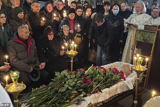 Family and friends pay their last respects at the coffin of Russian opposition leader Alexei Navalny at the Church of the Icon of the Mother of God Soothes My Sorrows, March 1.