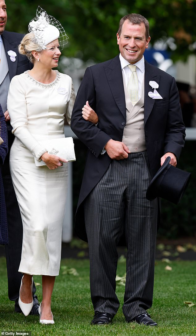Princess Anne's son, 46, described as the unluckiest love Royal of his generation, began dating Lindsay Wallace, 43, in 2021 after ending his marriage to Autumn Kelly, 45, in 2021 Pictured: The couple at Ascot Racecourse on June 18, 2022