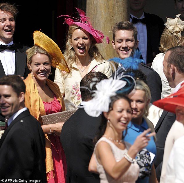 Lindsay was photographed laughing and cheering (in the back in a cream blouse and pink hat) at Zara's wedding to rugby star Mike Tindall in 2011.