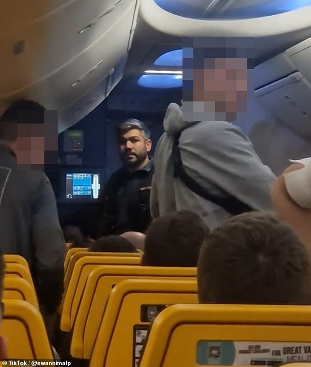 A passenger had to be escorted by police off a Ryanair flight from Manchester to Alicante after 'drinking a bottle of Disaronno'