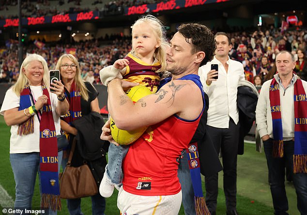 Neale brought his daughter Piper along as he celebrated his 250th AFL match