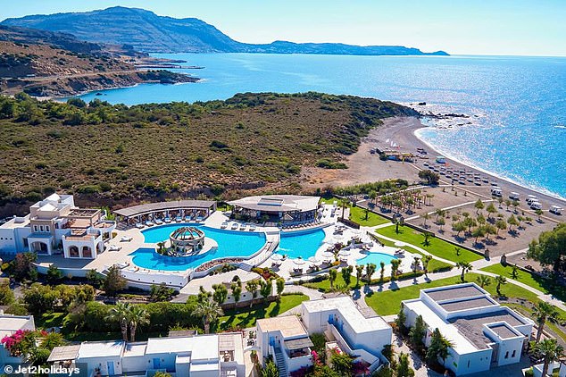 Before the fires: The Lindian Village Beach Resort in Rhodes is seen in this aerial image shown on the Jet2Holidays website, showing what the pool area looked like before the July bushfires.