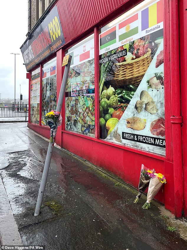 Floral tributes left outside a shop in Westgate, Bradford, near where Kulsuma was stabbed to death