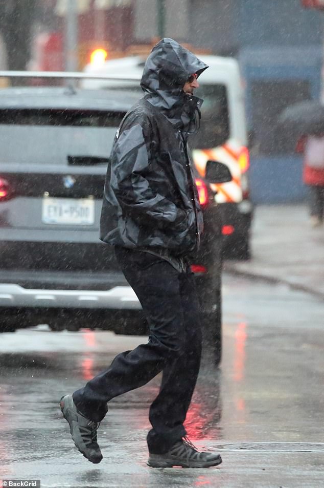 The star was running errands in the Big Apple during the storm, without his girlfriend, model Gigi Hadid, 28.