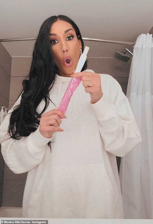 Monica took to Instagram on Thursday where she filmed herself taking a pregnancy test.