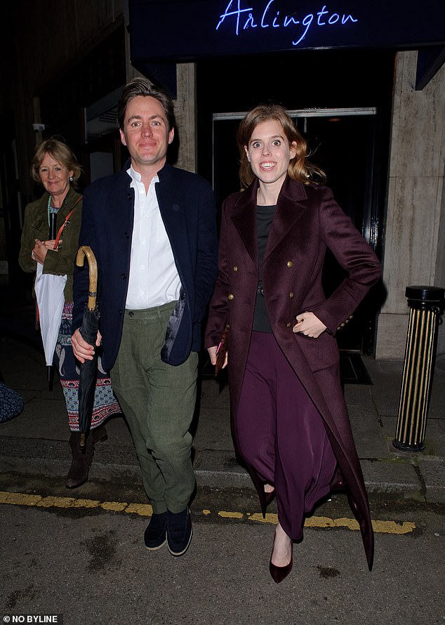 For last night's outing, the King's niece wore a deep purple coat with gold buttons over a sophisticated black top and long skirt.