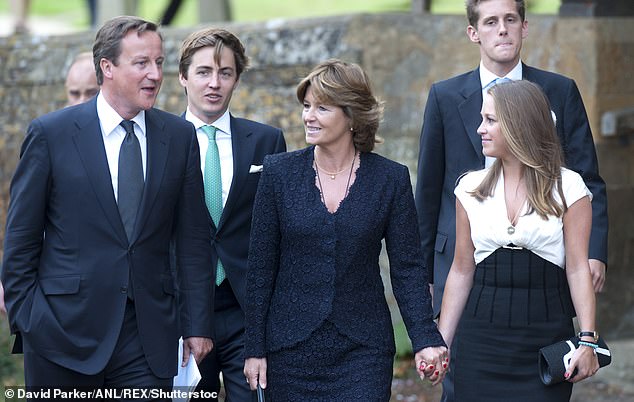 Nikki was married to Christopher Shale, a senior Conservative and close friend of former Prime Minister David Cameron, before his death at the Glastonbury Festival (pictured, Edo with Nikki and David Cameron in 2011 after the memorial service).