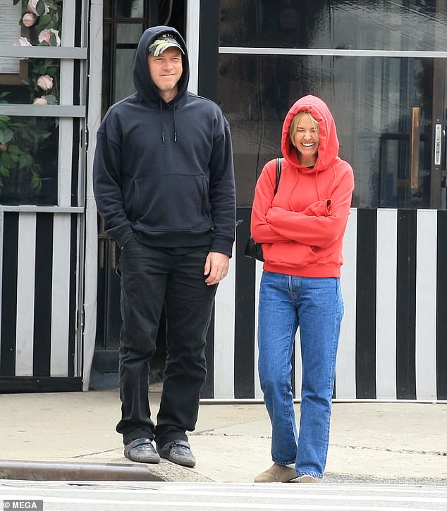 The couple then walked around their neighborhood going to a sandwich shop.