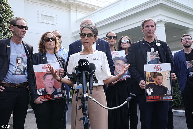 Rachel Goldberg, center, mother of American hostage Hersh Goldberg-Polin, along with other hostage families in Gaza, speaks to reporters outside the White House in Washington, Tuesday, April 9, 2024. They met with Vice President Kamala Harris on Tuesday.