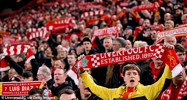 Some Liverpool fans inside Anfield stayed behind after full time to carry Atalanta players off the pitch.