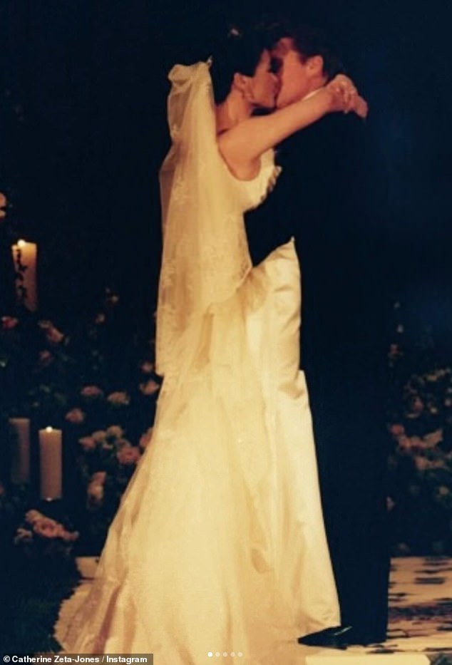 One image showed them kissing during their ceremony at The Plaza in New York City in 2000 (pictured).