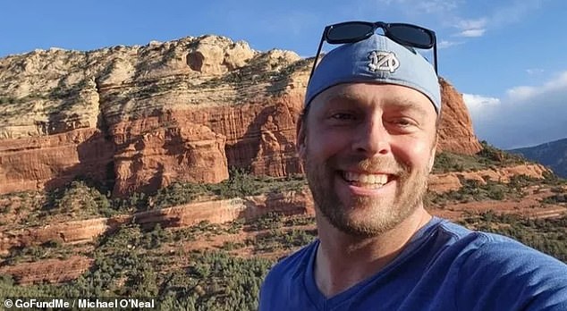 Michael O'Neal, 39, pictured on a GoFundMe page set up by friends to help his family at this time.