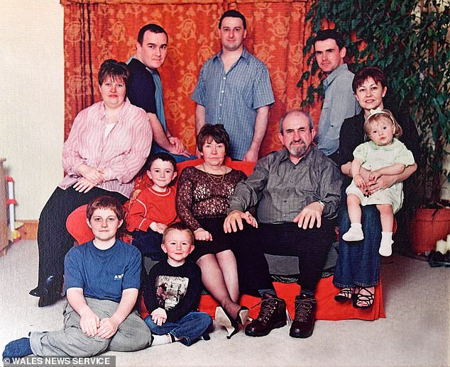 A family photo from the early 2000s. Brian and Margaret have three children, five grandchildren and four great-grandchildren.