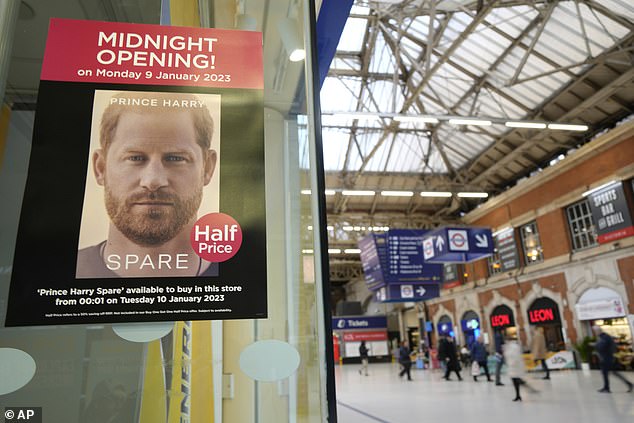 A sign advertises the midnight opening of a WH Smith store in London to sell Spare last year.