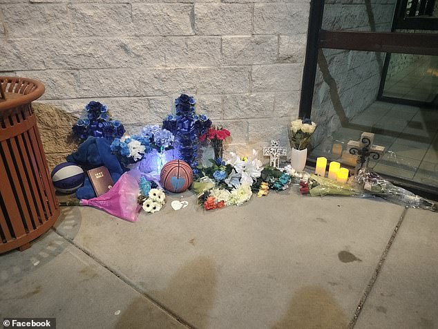 Flowers are left at the Bobby Maher memorials in Casper, Wyoming