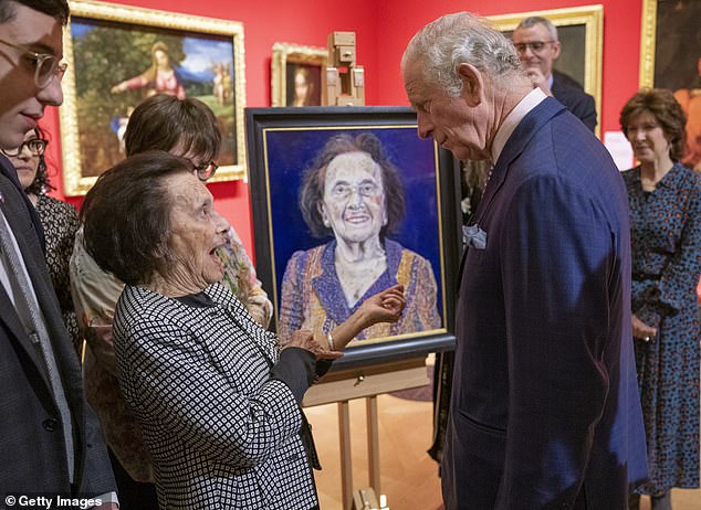 King Charles (then Prince of Wales) speaks with Lily Ebert at an exhibition of Seven Portraits: Surviving the Holocaust, which were commissioned by Charles to pay tribute to Holocaust survivors, at The Queens Gallery, Buckingham Palace, on 24 January 2022.