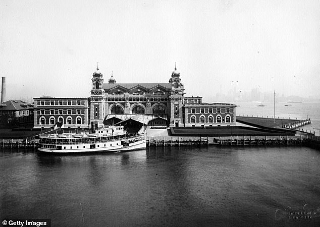 An exterior photograph of the front facade of the Ellis Island Immigration Inspection Station, known as the French Renaissance Building, from 1907.