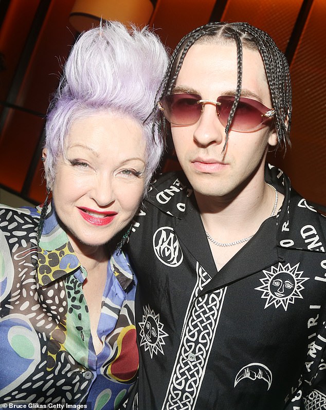 Cyndi Lauper and her son Declyn "dex" Lauper poses at Tribeca Film Festival premiere after party for Cyndi Lauper documentary "Let the Canary sing" at Serafina UWS on June 14, 2023
