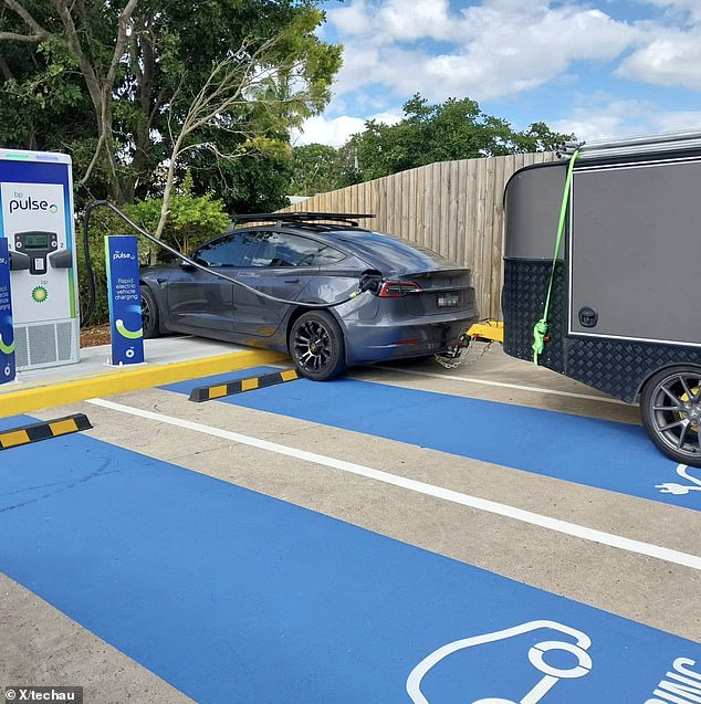 The original image of the Tesla, which had been cropped, reappeared to reveal the car was towing a trailer, highlighting another issue with Australia's electric vehicle charging stations not being equipped for cars towing caravans.